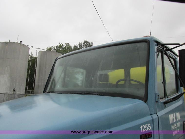 image for item I8910 1999 Freightliner FL70 fuel truck