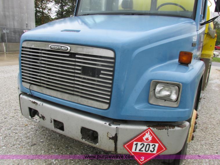 image for item I8910 1999 Freightliner FL70 fuel truck