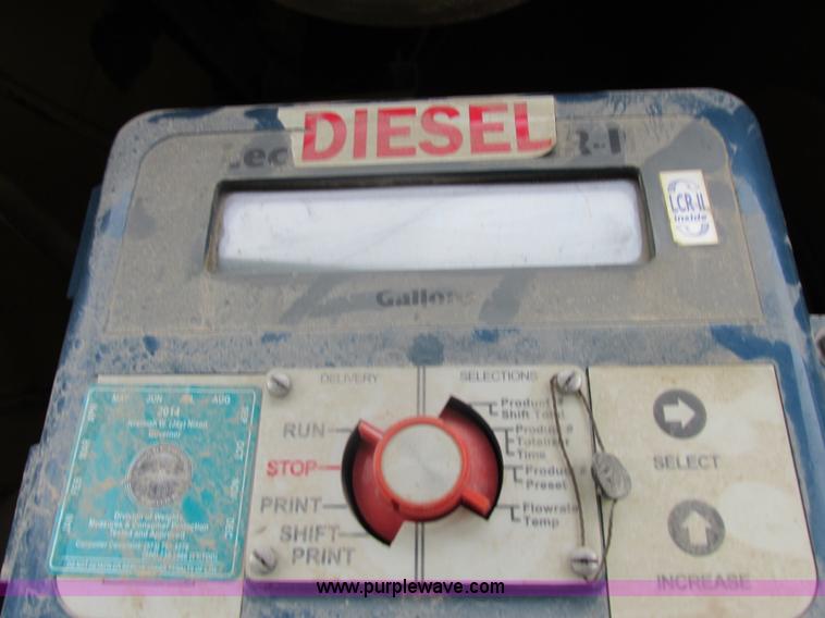 image for item I8910 1999 Freightliner FL70 fuel truck