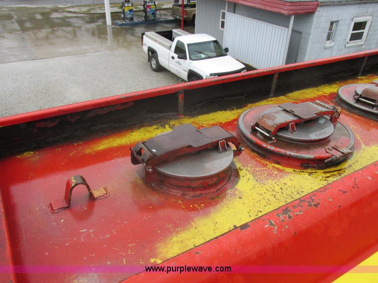 image for item I8910 1999 Freightliner FL70 fuel truck