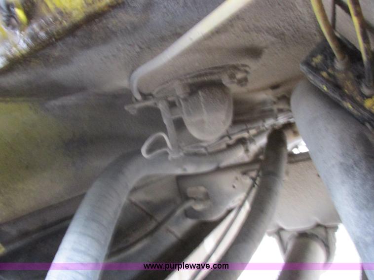 image for item I8910 1999 Freightliner FL70 fuel truck