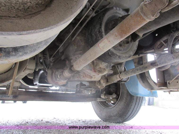 image for item I8910 1999 Freightliner FL70 fuel truck