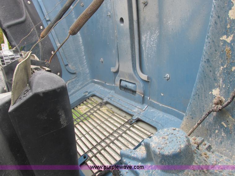 image for item I8910 1999 Freightliner FL70 fuel truck