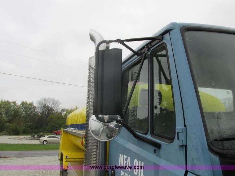 image for item I8910 1999 Freightliner FL70 fuel truck