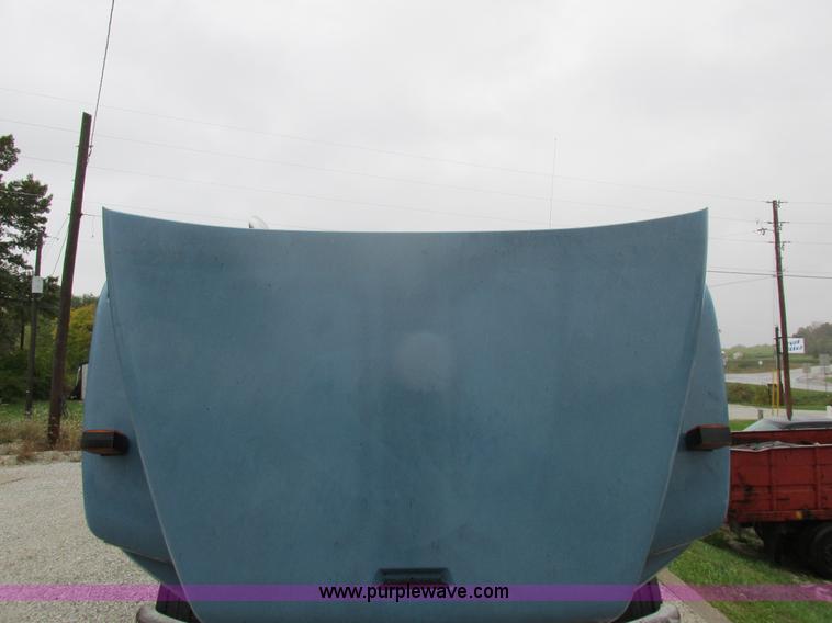 image for item I8910 1999 Freightliner FL70 fuel truck