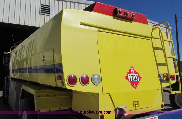 image for item I8912 1997 Freightliner FL70 fuel truck