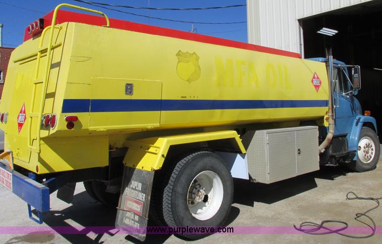 image for item I8912 1997 Freightliner FL70 fuel truck