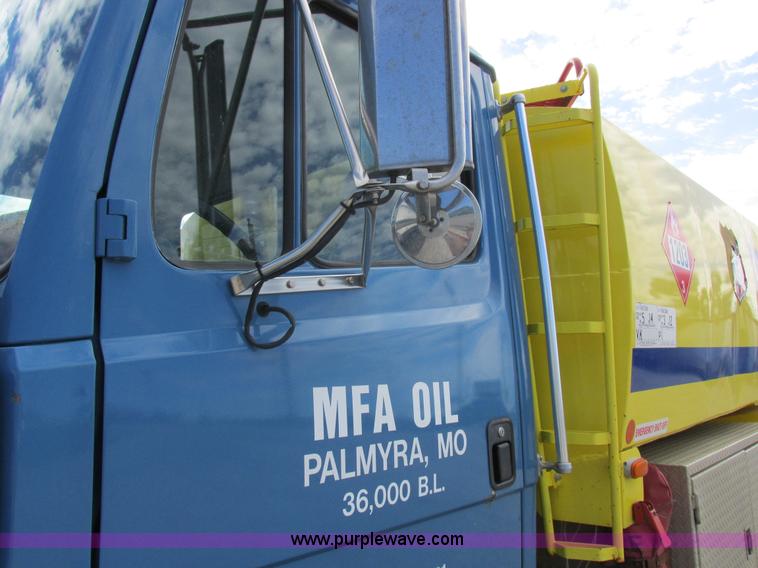 image for item I8912 1997 Freightliner FL70 fuel truck