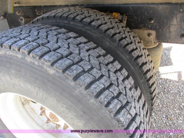 image for item I8912 1997 Freightliner FL70 fuel truck