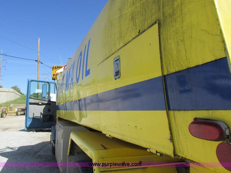 image for item I8912 1997 Freightliner FL70 fuel truck