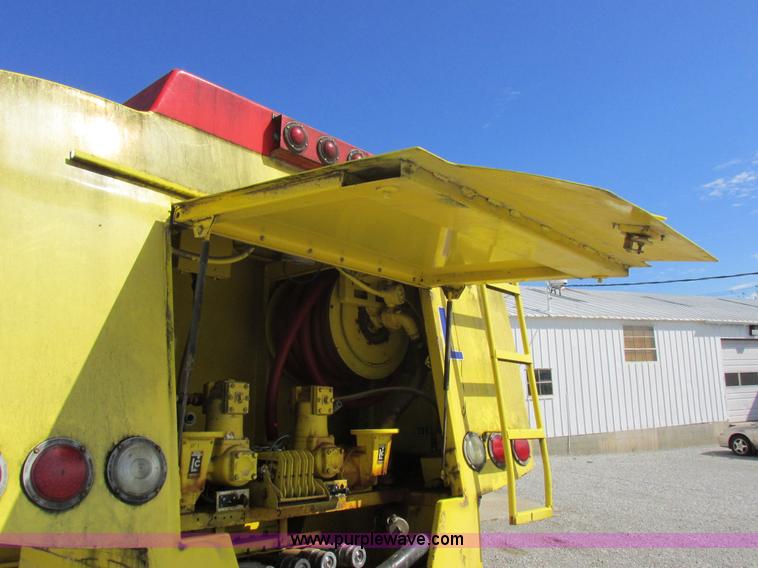 image for item I8912 1997 Freightliner FL70 fuel truck