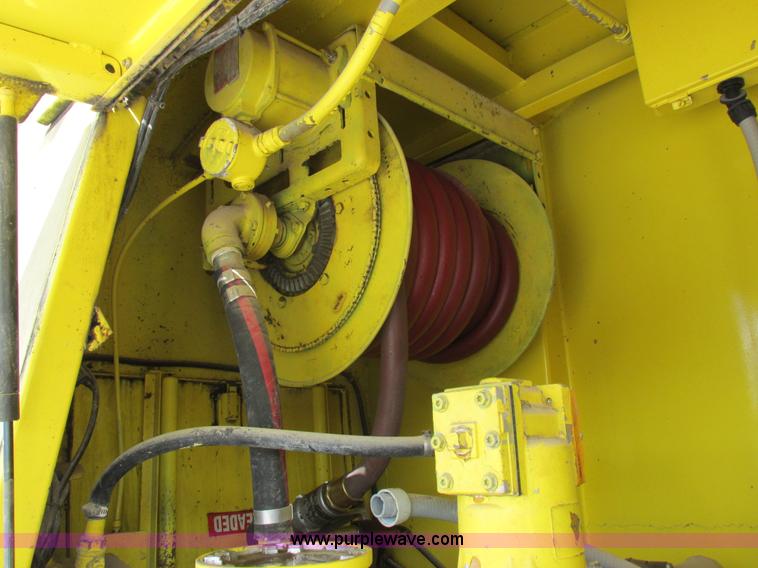 image for item I8912 1997 Freightliner FL70 fuel truck