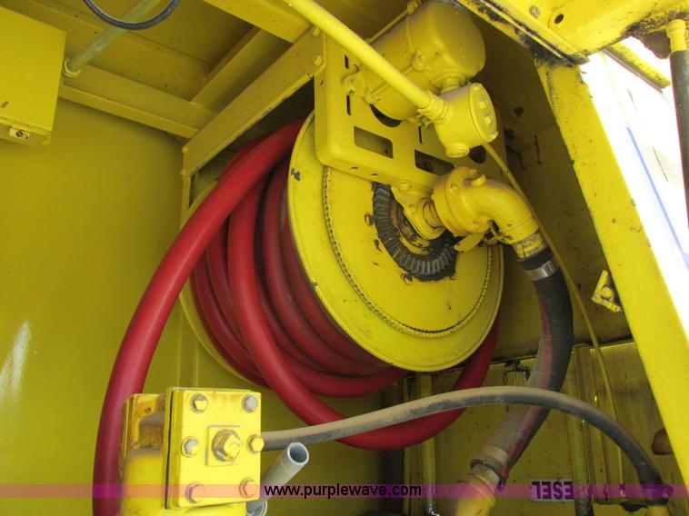 image for item I8912 1997 Freightliner FL70 fuel truck