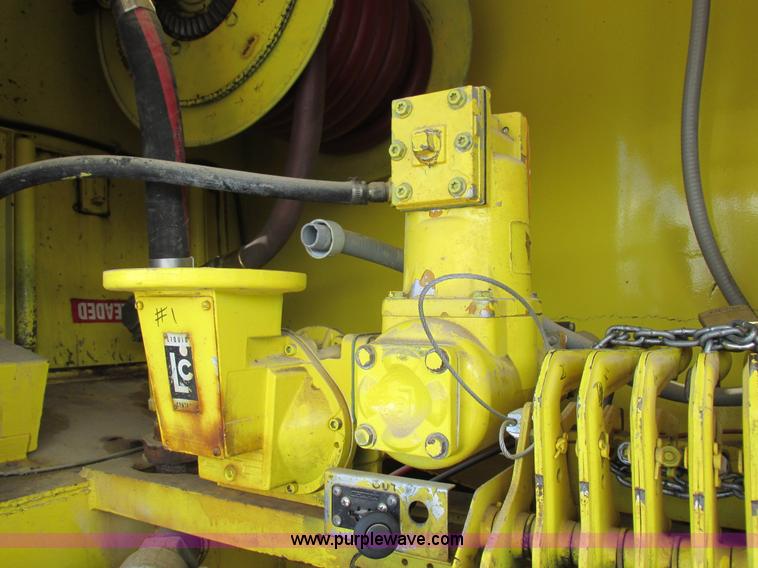 image for item I8912 1997 Freightliner FL70 fuel truck