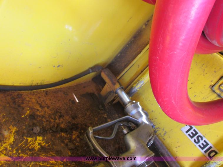 image for item I8912 1997 Freightliner FL70 fuel truck