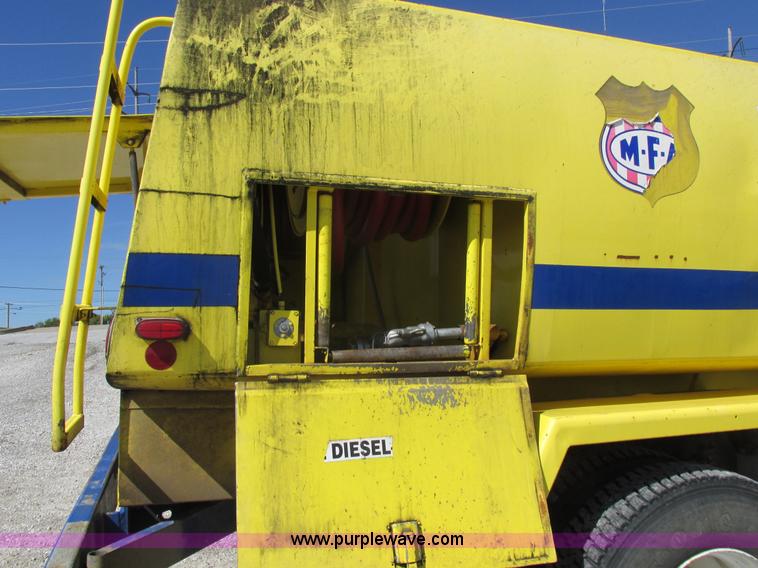 image for item I8912 1997 Freightliner FL70 fuel truck