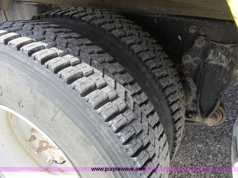 image for item I8912 1997 Freightliner FL70 fuel truck