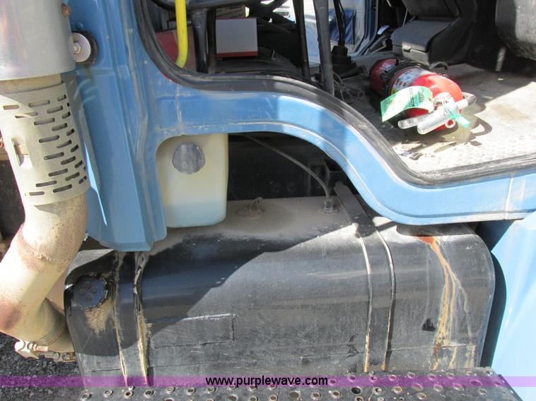 image for item I8912 1997 Freightliner FL70 fuel truck