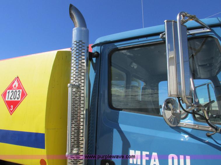 image for item I8912 1997 Freightliner FL70 fuel truck