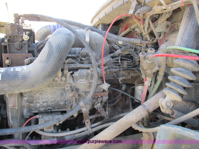 image for item I8912 1997 Freightliner FL70 fuel truck