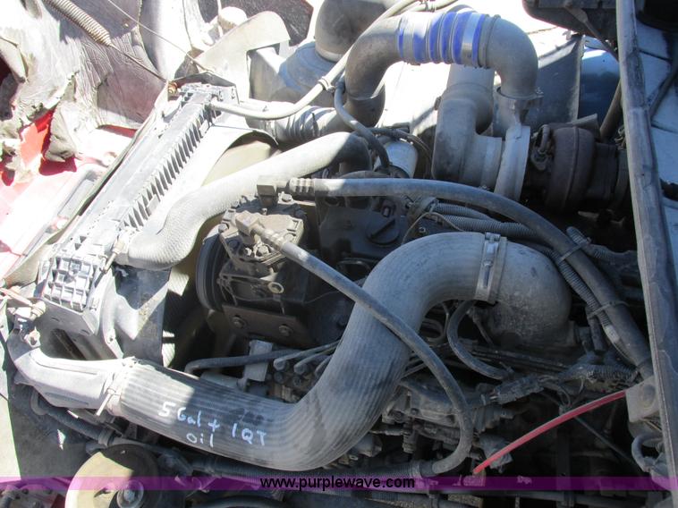 image for item I8912 1997 Freightliner FL70 fuel truck