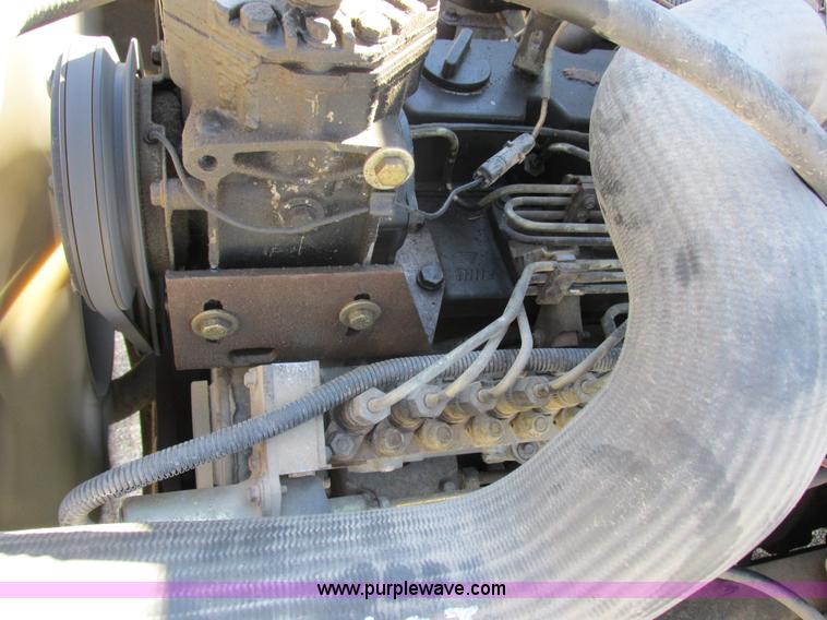 image for item I8912 1997 Freightliner FL70 fuel truck