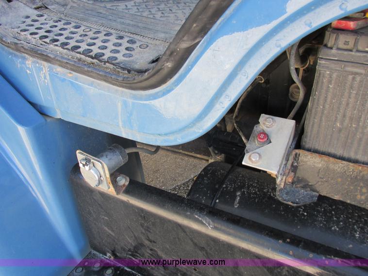 image for item I8912 1997 Freightliner FL70 fuel truck