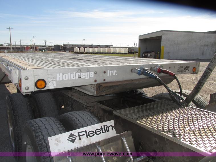 image for item G9913 1997 Chaparral 48102 aluminum flatbed trailer
