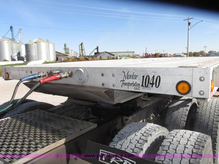 image for item G9913 1997 Chaparral 48102 aluminum flatbed trailer
