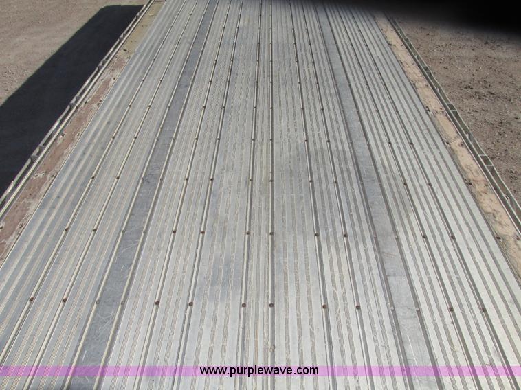 image for item G9913 1997 Chaparral 48102 aluminum flatbed trailer