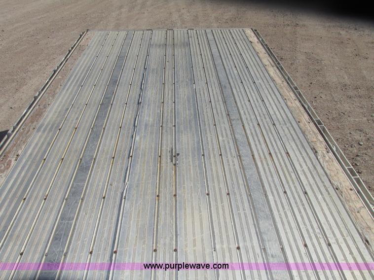 image for item G9913 1997 Chaparral 48102 aluminum flatbed trailer