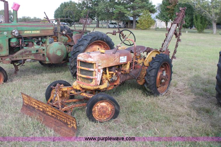 image for item H5588 1948 McCormick Farmall Cub Lowboy tractor with trencher