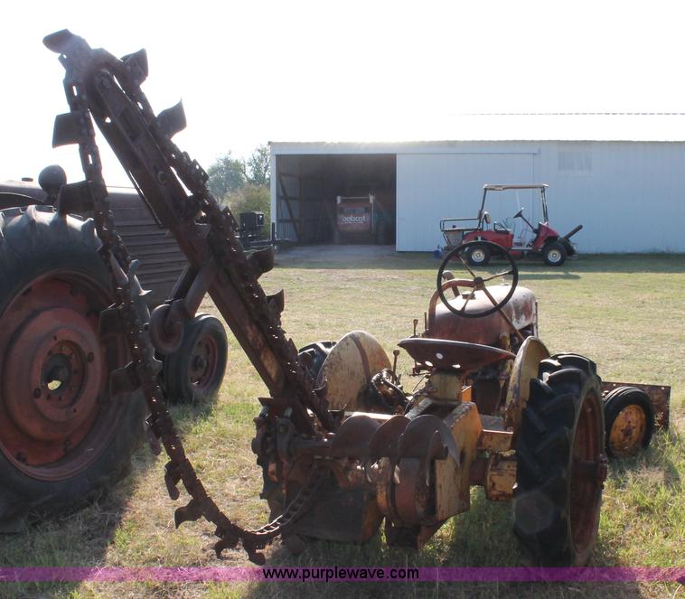 image for item H5588 1948 McCormick Farmall Cub Lowboy tractor with trencher