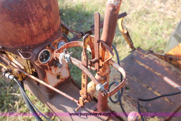 image for item H5588 1948 McCormick Farmall Cub Lowboy tractor with trencher