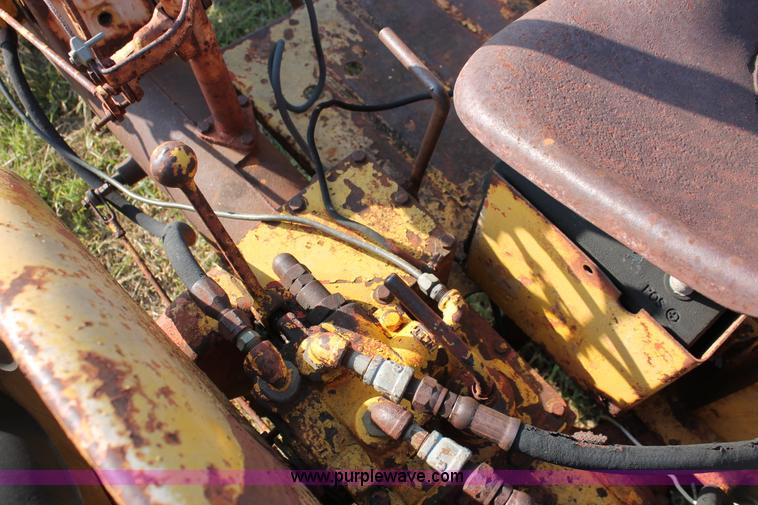 image for item H5588 1948 McCormick Farmall Cub Lowboy tractor with trencher