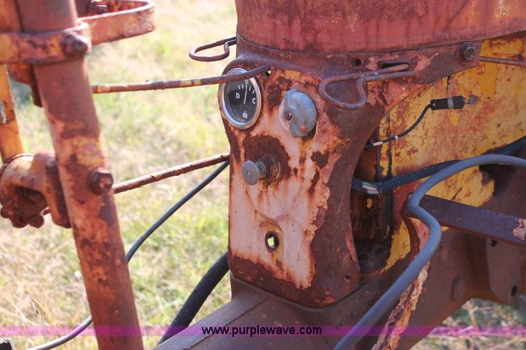 image for item H5588 1948 McCormick Farmall Cub Lowboy tractor with trencher