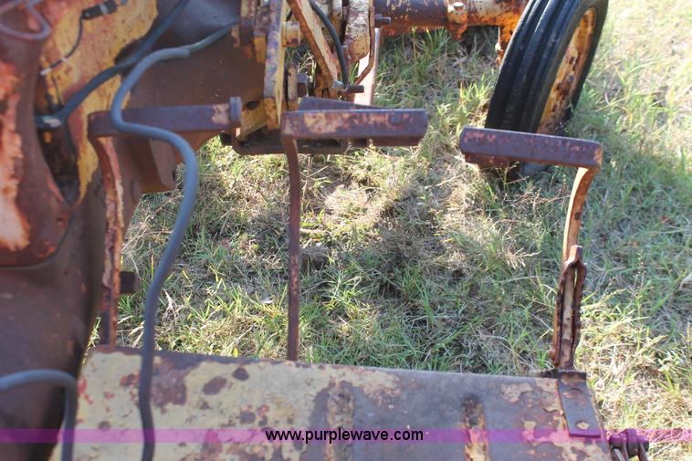 image for item H5588 1948 McCormick Farmall Cub Lowboy tractor with trencher