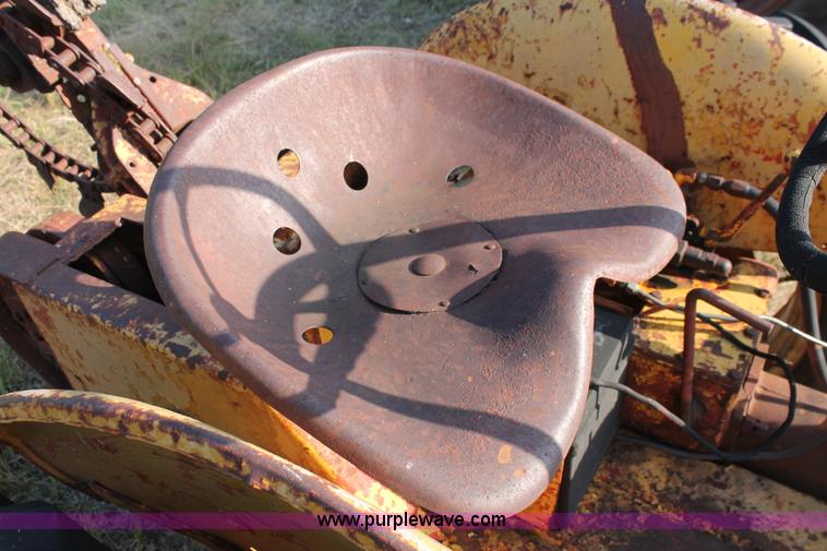 image for item H5588 1948 McCormick Farmall Cub Lowboy tractor with trencher