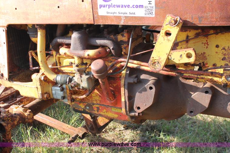 image for item H5588 1948 McCormick Farmall Cub Lowboy tractor with trencher