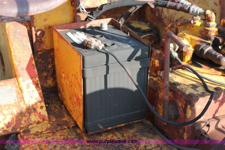 image for item H5588 1948 McCormick Farmall Cub Lowboy tractor with trencher