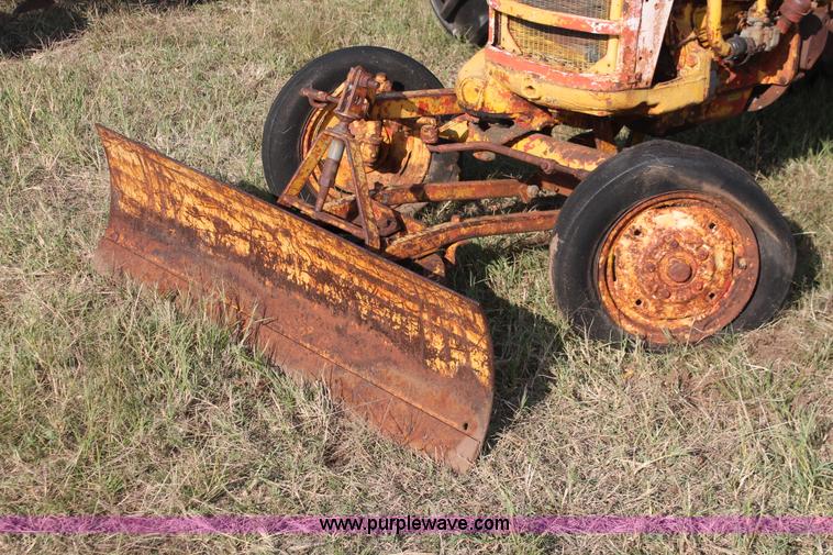 image for item H5588 1948 McCormick Farmall Cub Lowboy tractor with trencher