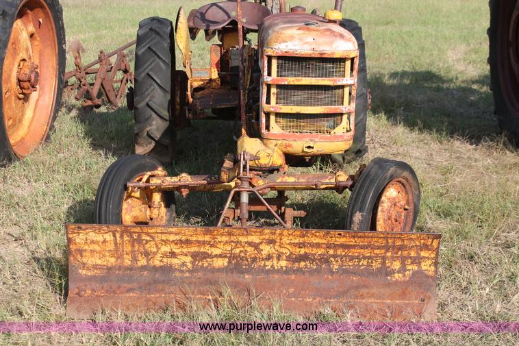 image for item H5588 1948 McCormick Farmall Cub Lowboy tractor with trencher