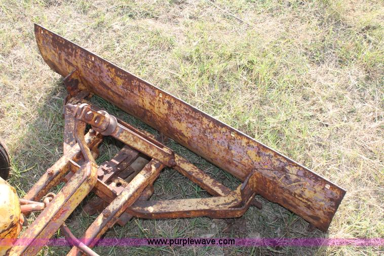 image for item H5588 1948 McCormick Farmall Cub Lowboy tractor with trencher