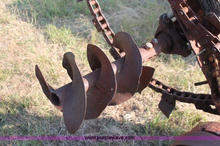 image for item H5588 1948 McCormick Farmall Cub Lowboy tractor with trencher