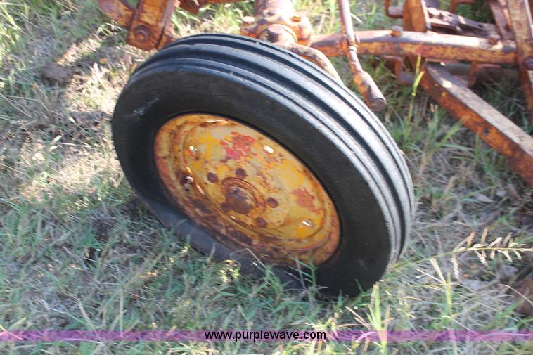 image for item H5588 1948 McCormick Farmall Cub Lowboy tractor with trencher