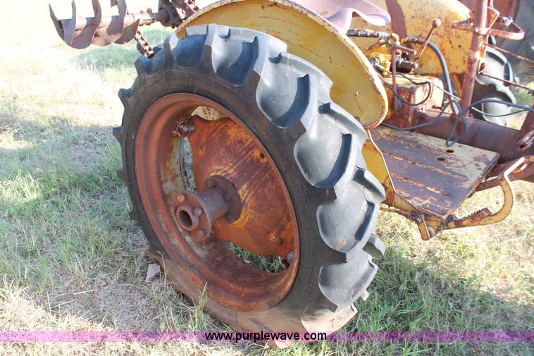 image for item H5588 1948 McCormick Farmall Cub Lowboy tractor with trencher