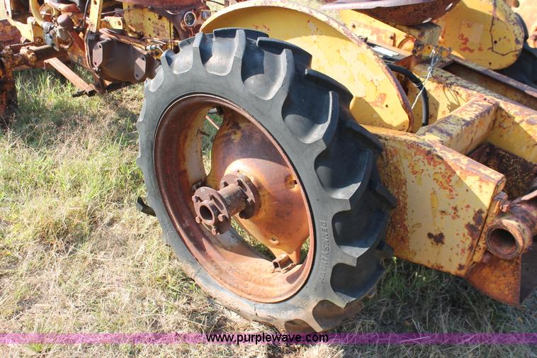 image for item H5588 1948 McCormick Farmall Cub Lowboy tractor with trencher