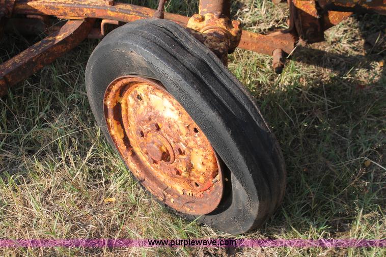 image for item H5588 1948 McCormick Farmall Cub Lowboy tractor with trencher