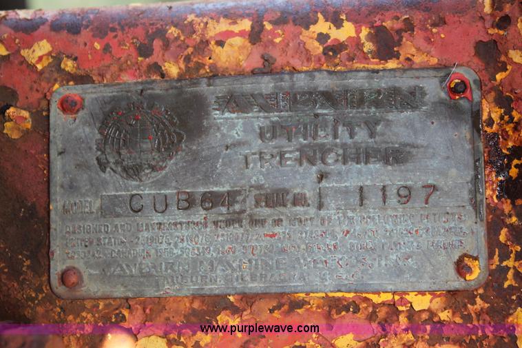 image for item H5588 1948 McCormick Farmall Cub Lowboy tractor with trencher