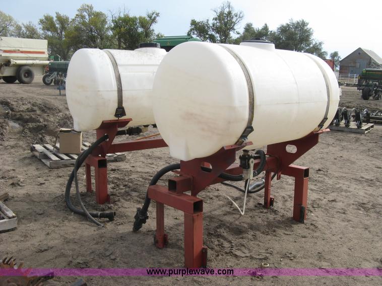 image for item H9417 (2) 200 gallon poly saddles tanks